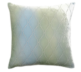 Decorative pillow with geometric pattern on a white background