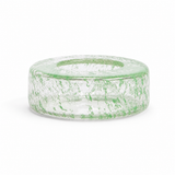 A round, clear glass candle holder or dish with a textured green crackle pattern, shown on a plain white background.