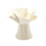 White ceramic vase with a unique design on a white background
