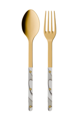 Gold spoon and fork with marble pattern handles on a white background