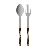 Silver spoon and fork with tortoiseshell handles on a white background